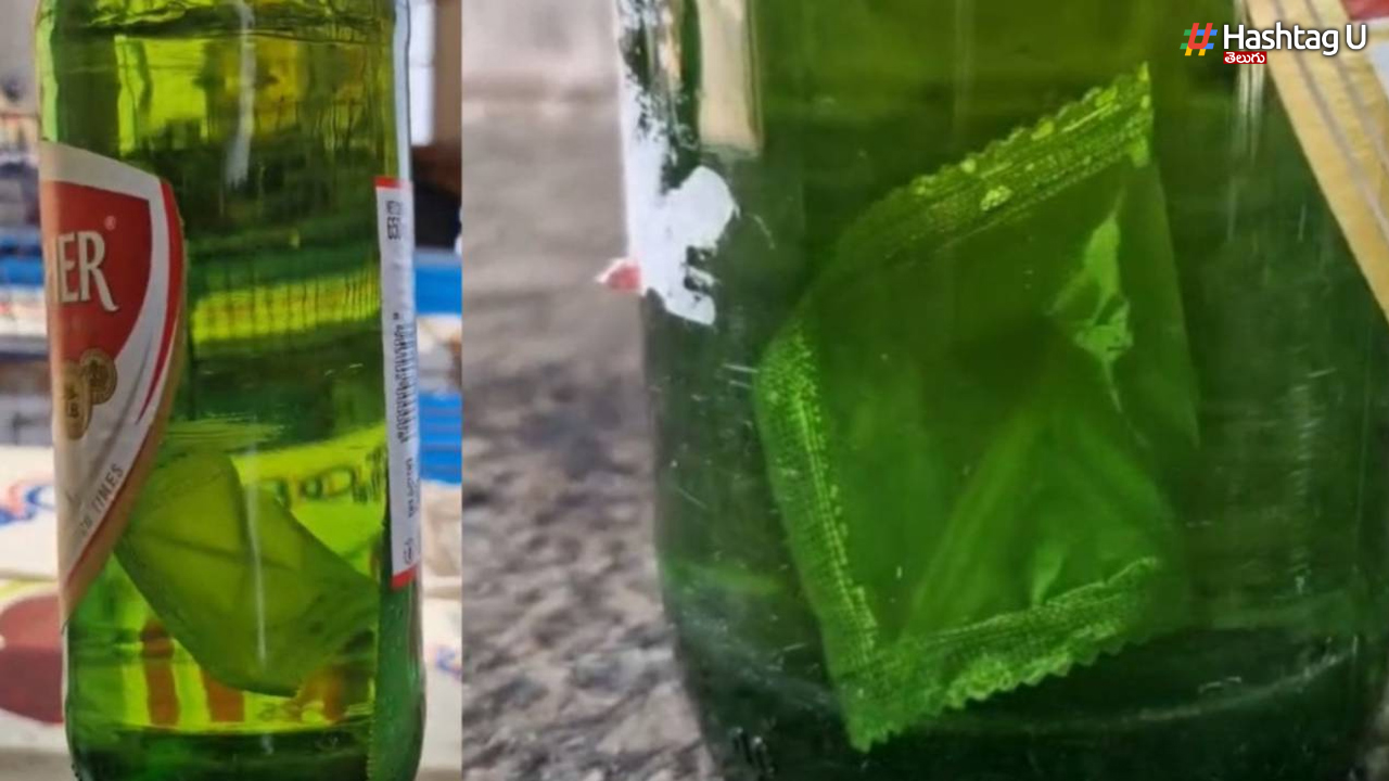 Condom packet in a beer bottle